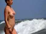 topless beach photo image public nudity