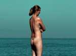 naturism nude body paint nude woman in beach